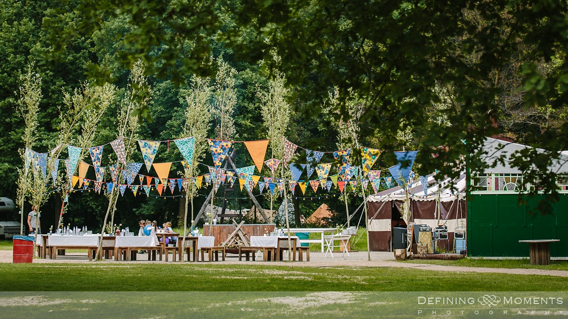 festival wedding venues surrey photographer marquee tipi bohemian photography outdoor ceremony colourful decorations flags lights lantern