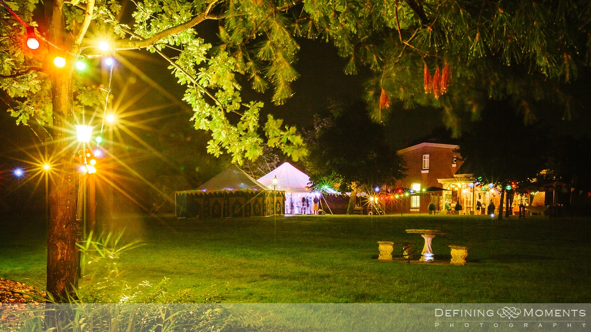 festival wedding venues surrey photographer marquee tipi bohemian photography outdoor ceremony colourful decorations flags lights lantern