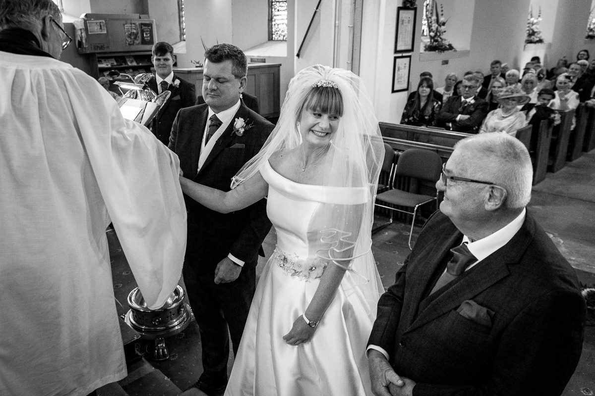 brockham christ church wedding ceremony bride groom surrey natural and authentic wedding portraits by documentary wedding photographer surrey and sussex