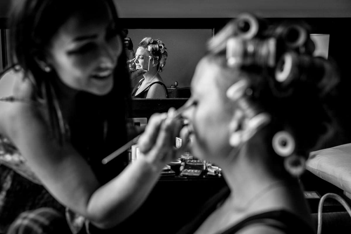 reflection image of guildford harbour_hotel bridal_prep same_sex_wedding gay_couple natural authentic documentary wedding photo photographer