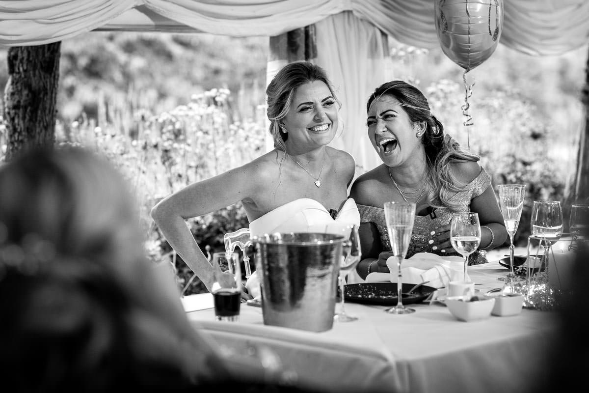 speeches during wedding breakfast at lesbian wedding in lgbtq friendly outdoor wedding venue russets country house surrey for same_sex_wedding and natural authentic wedding portraits by documentary wedding photographer