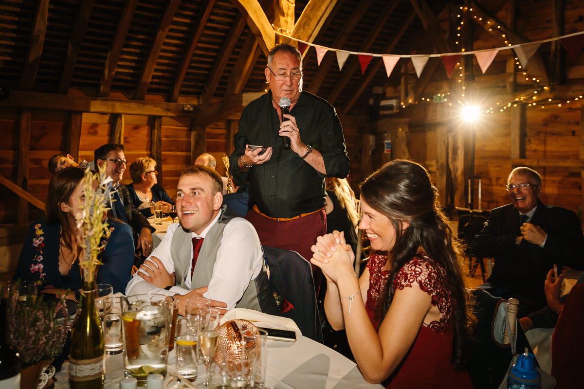 gildings barns newdigate wedding breakfast speeches natural authentic colourful wedding portraits by documentary wedding photographer guildford surrey and horsham west_sussex
