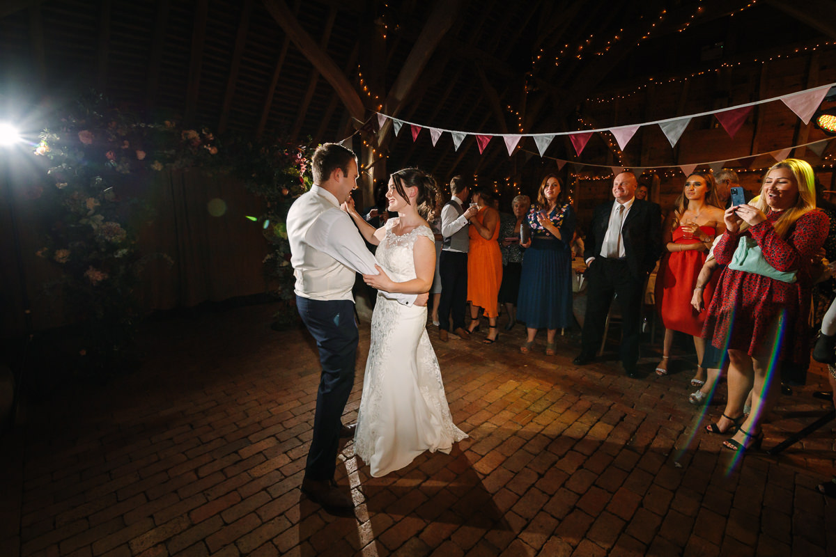 gildings barns newdigate bride and groom first dance natural authentic colourful wedding photography documentary wedding photographer guildford surrey and horsham west_sussex