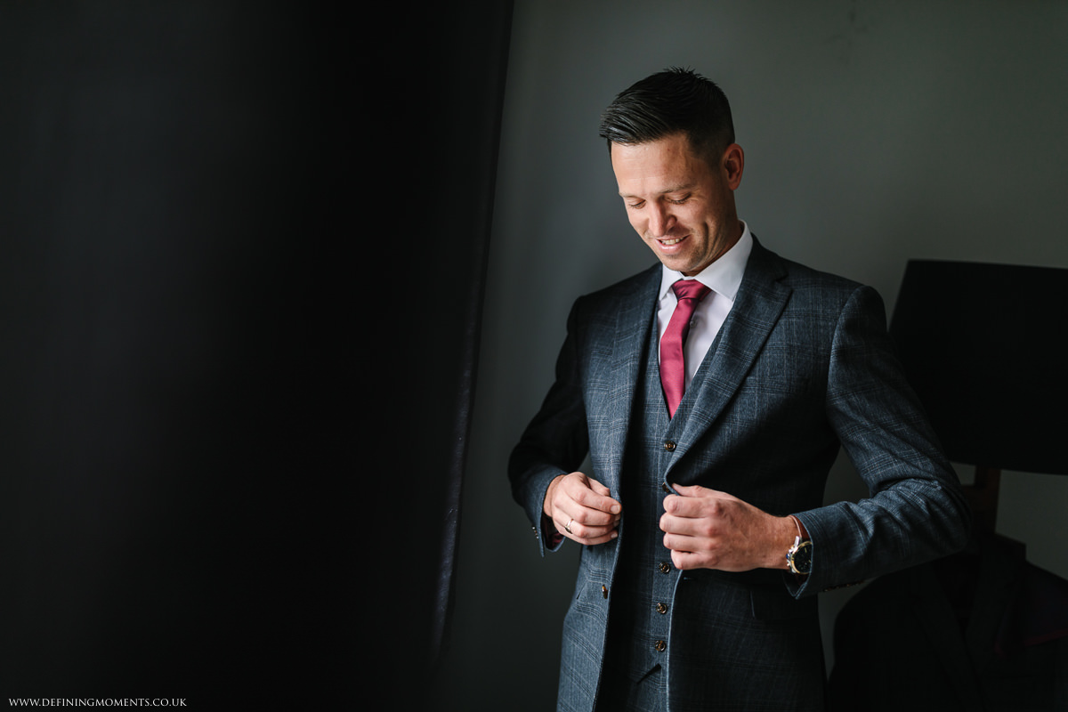 smiling groom during groom prep natural authentic documentary wedding photography photographer surrey sussex