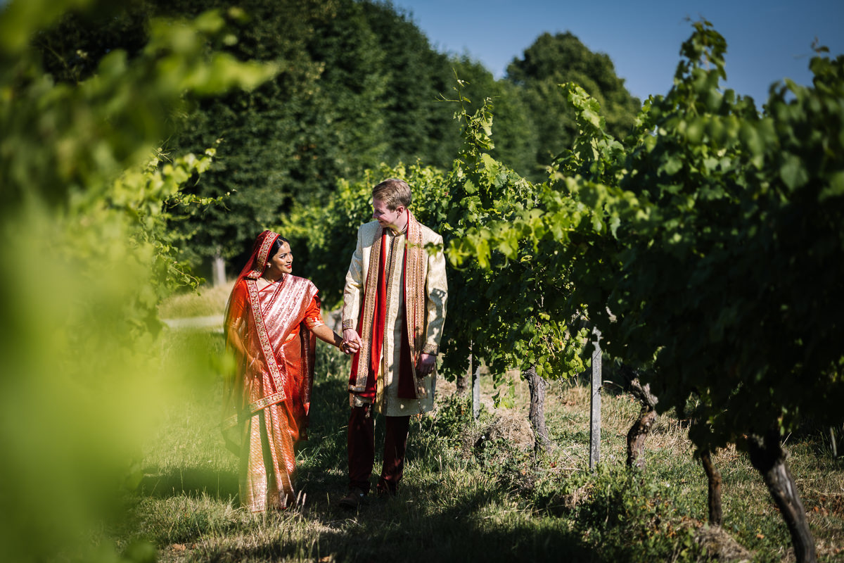 indian bride english groom couple portraits outdoor for fusion wedding at denbies vineyard wedding photography by documentary wedding_photographer surrey for natural candid colourful authentic unposed relaxed images