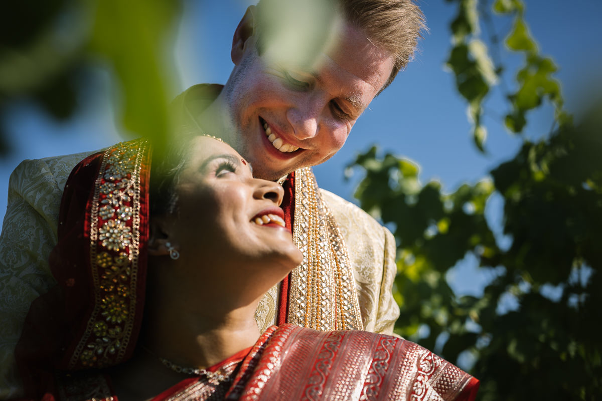 indian bride english groom couple portraits outdoor for fusion wedding at denbies vineyard wedding photography by documentary wedding_photographer surrey for natural candid colourful authentic unposed relaxed images