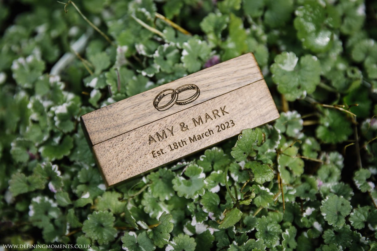 engraved wooden box for wedding rings close_up colour photo gildings_barns-documentary-wedding-photographer-surrey-sussex