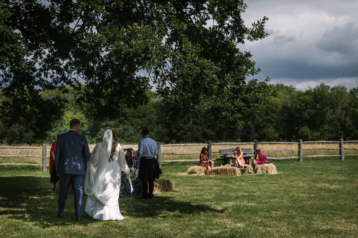 bride and groom during wedding reception at relaxed gildings_barns wedding photography by documentary wedding photographer surrey sussex