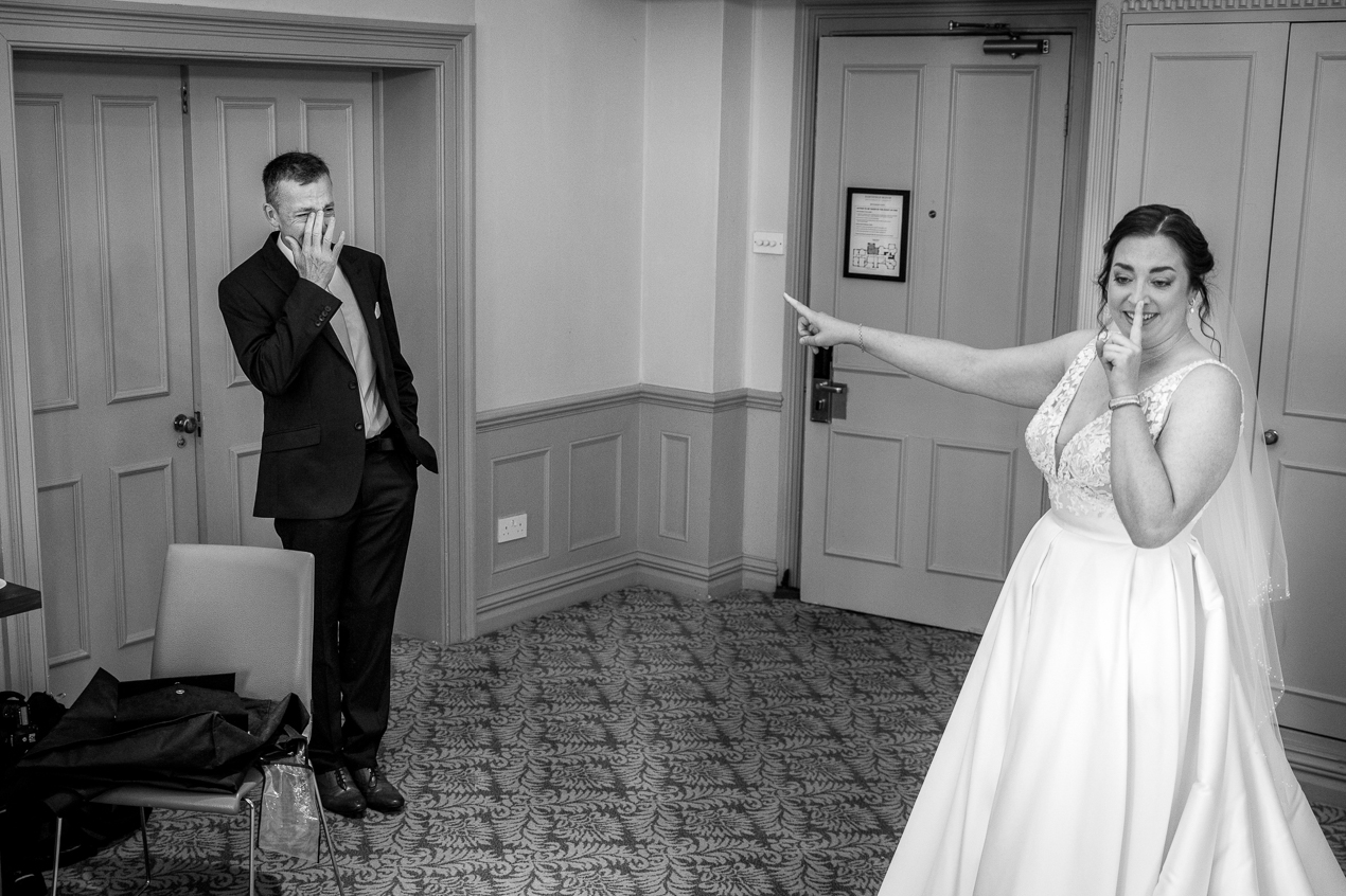 first look bride and father black_white image at Hartsfield_Manor_wedding Surrey by documentary wedding photographer surrey for candid natural unposed authentic LGBTQ_friendly documentary photography