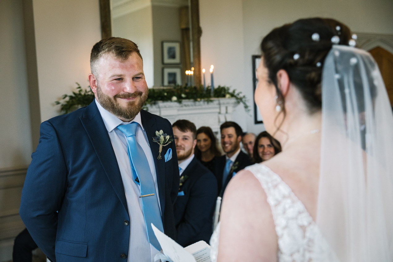 bride and groom during wedding ceremony at Hartsfield_Manor_wedding Surrey by documentary wedding photographer surrey for candid natural unposed authentic documentary photography