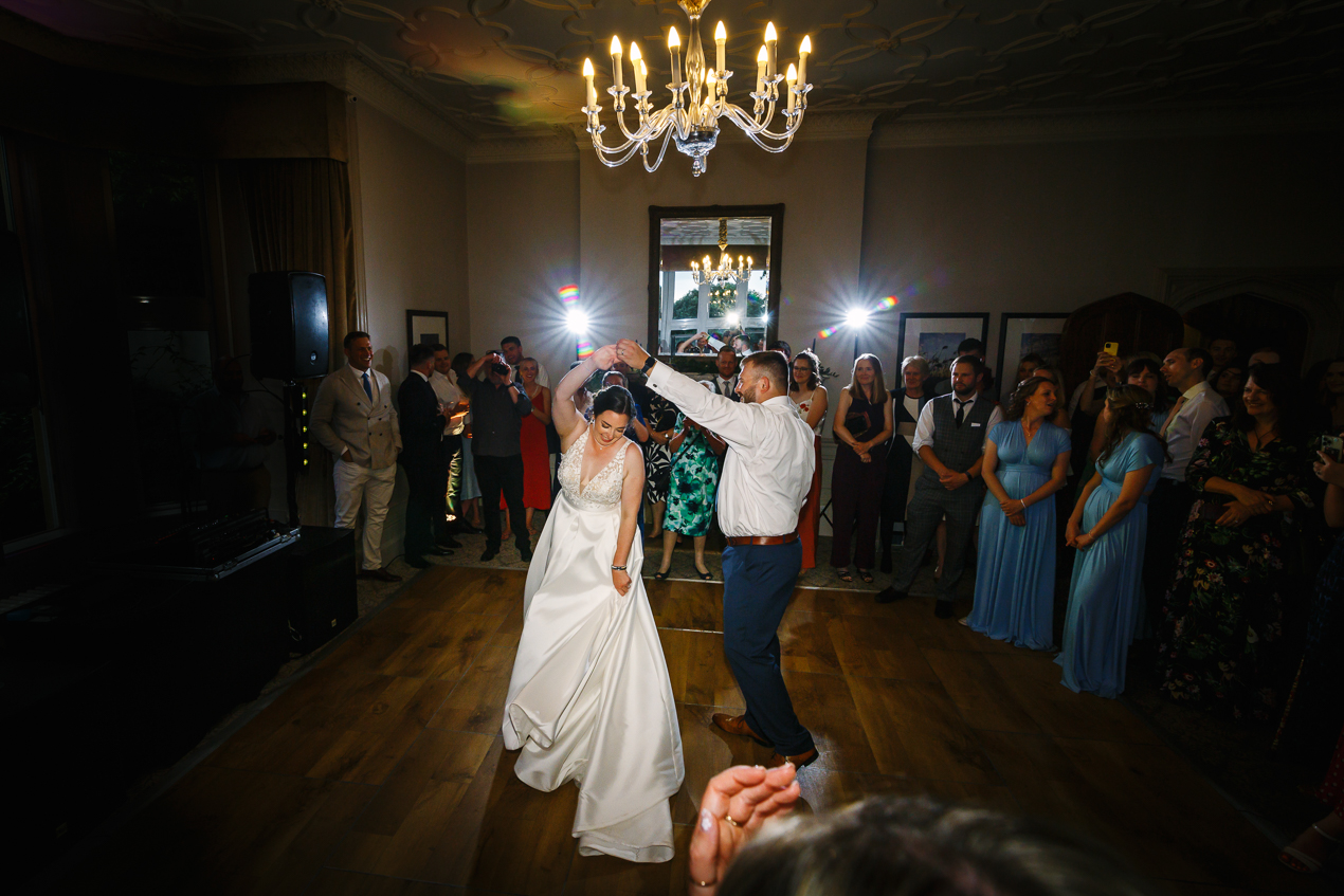 bride and groom frist dance at Hartsfield_Manor_wedding Surrey by documentary wedding photographer surrey for candid natural unposed authentic documentary photography