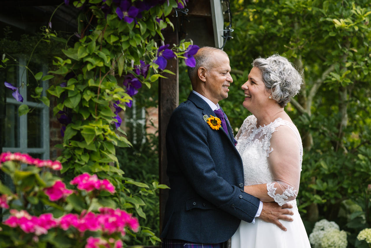 outdoor couple portrait at gate_street_barn wedding storytelling wedding photography by documentary wedding photographer surrey sussex