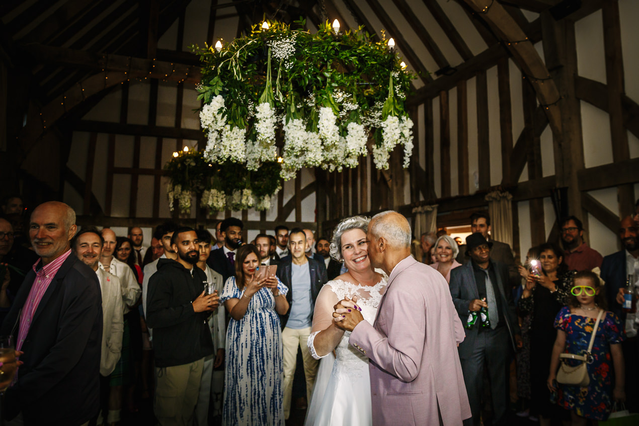 first dance of wedding couple at gate_street_barn wedding storytelling wedding photography by documentary wedding photographer surrey sussex